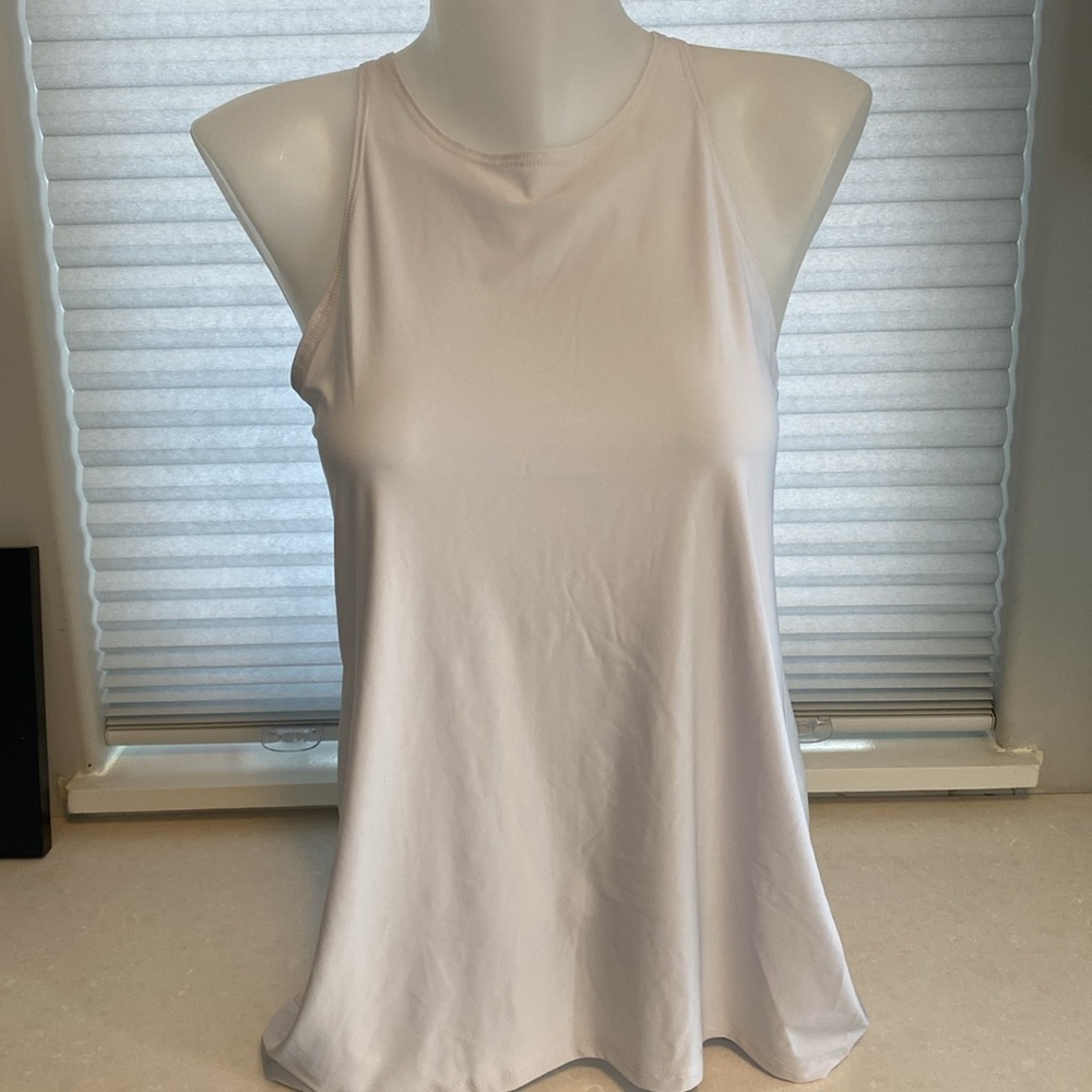 Onzie White One size open back Tank top. With tie bottom.
